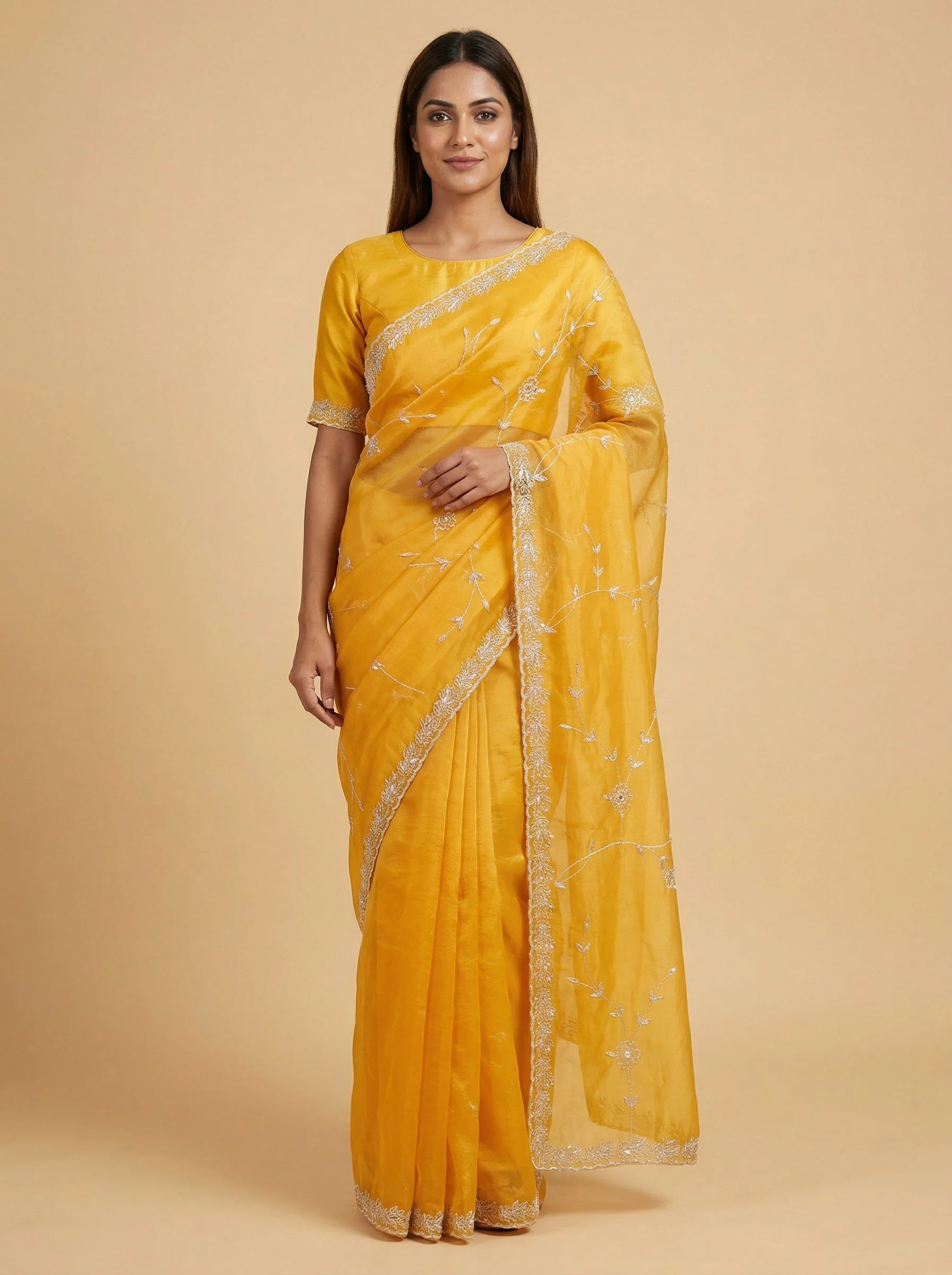 Amber Light Orange Embroidered Saree