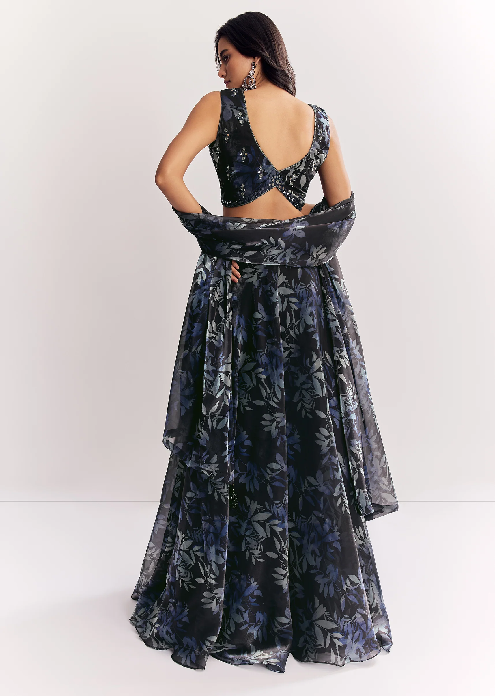 Elegant Festive Couple Set – Black Printed Mirror Work Lehenga Choli In Organza Tissue For Her And Black Matka Silk Jodhpuri Set With Mandarin Collar For Him - Image 5