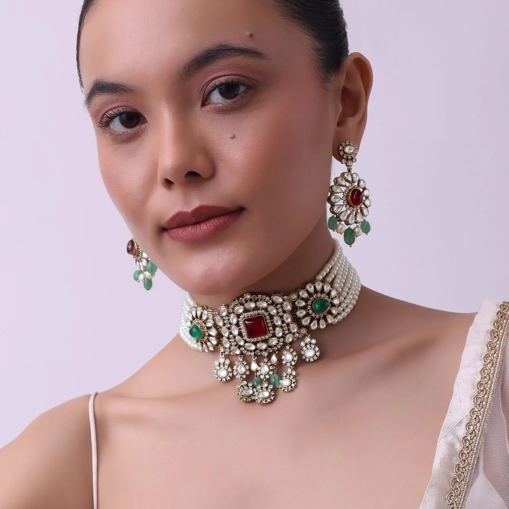 Gold Finish Kundan Choker Set With Synthetic Ruby And Emerald Stones - Image 2