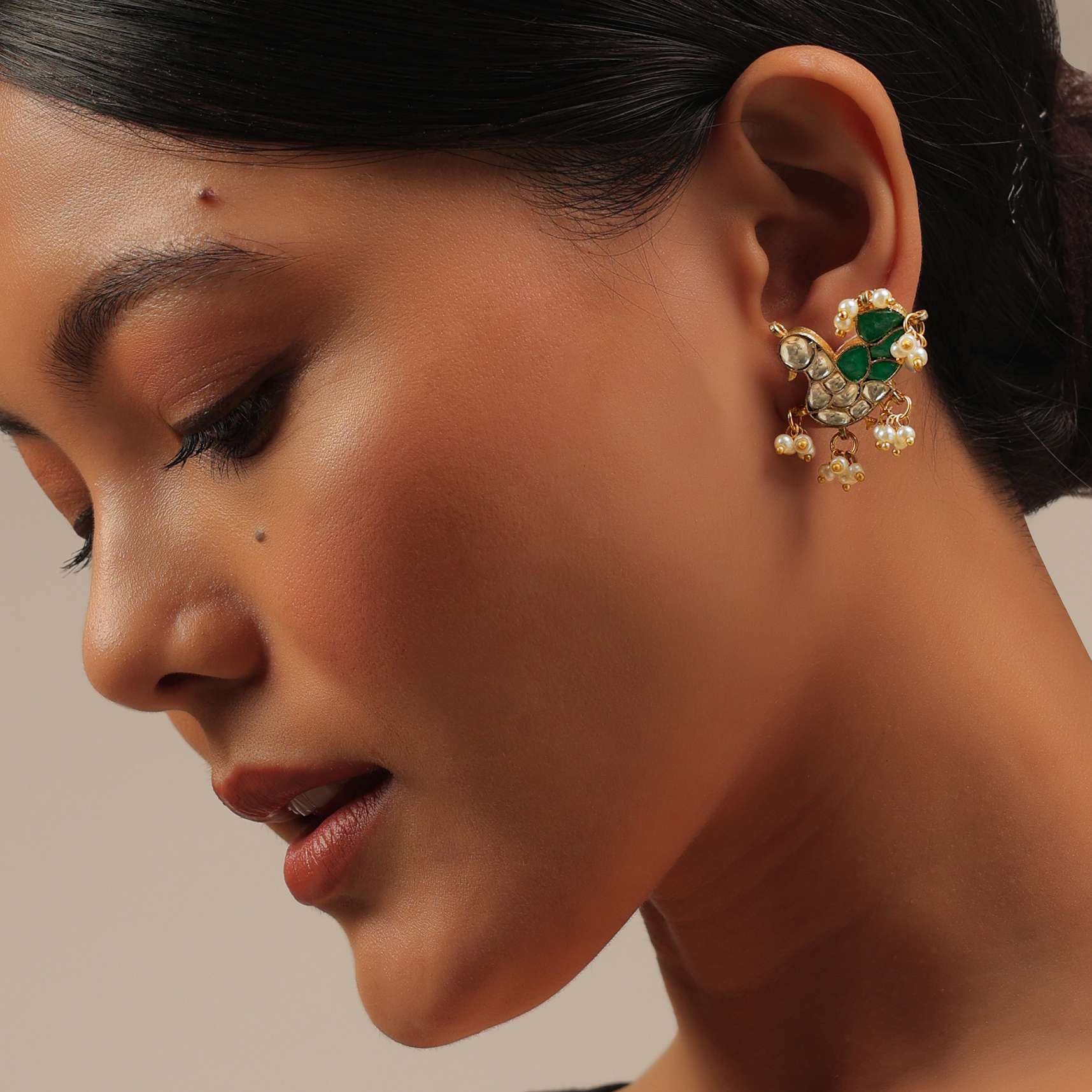 Gold Finish Kundan Polki Stud Earrings With Synthetic Emerald Stones With Beads - Image 2