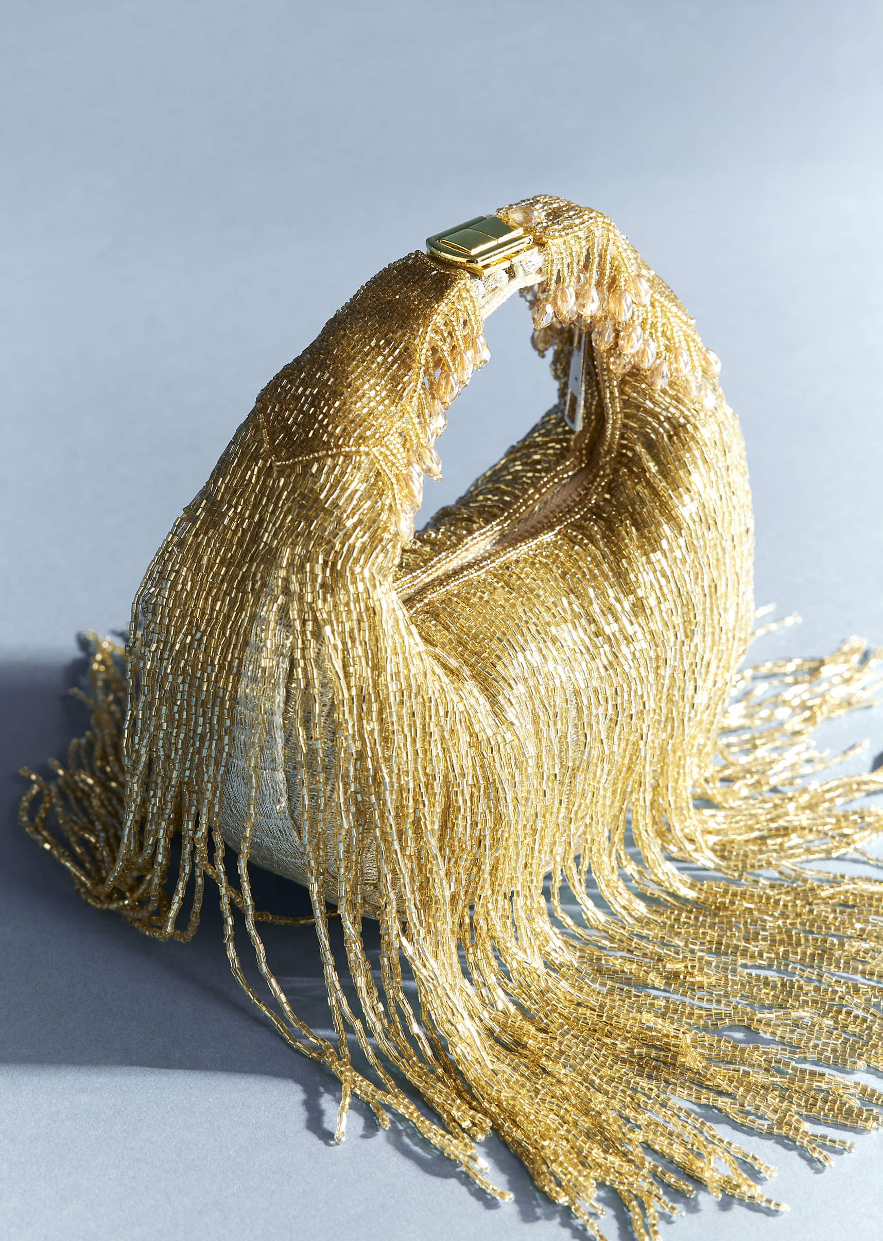 Gold Potli With Tassel Detailing - Image 2