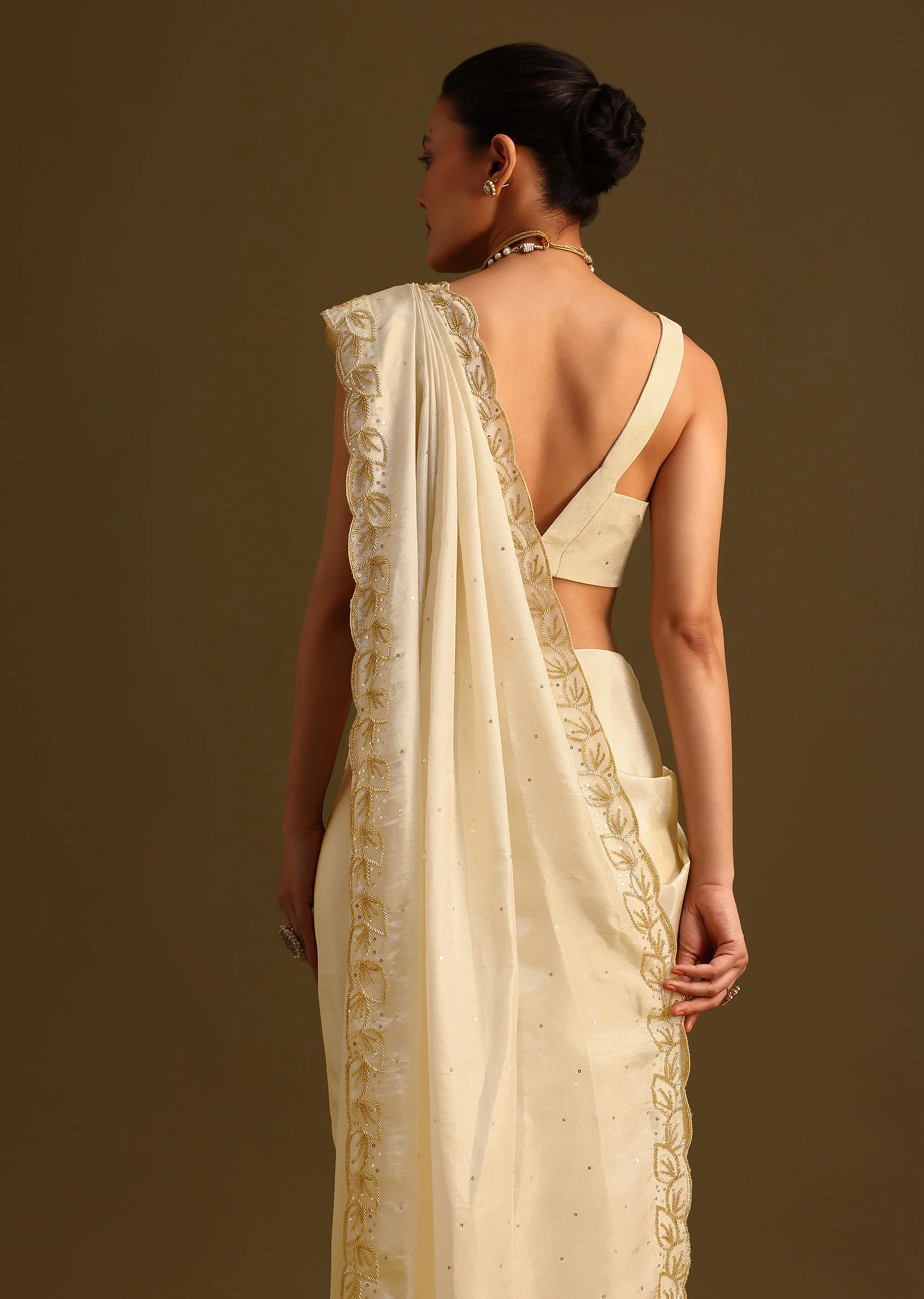Ivory Tissue Saree With Cutdana Embroidered Border and Unstitched Blouse - Image 4