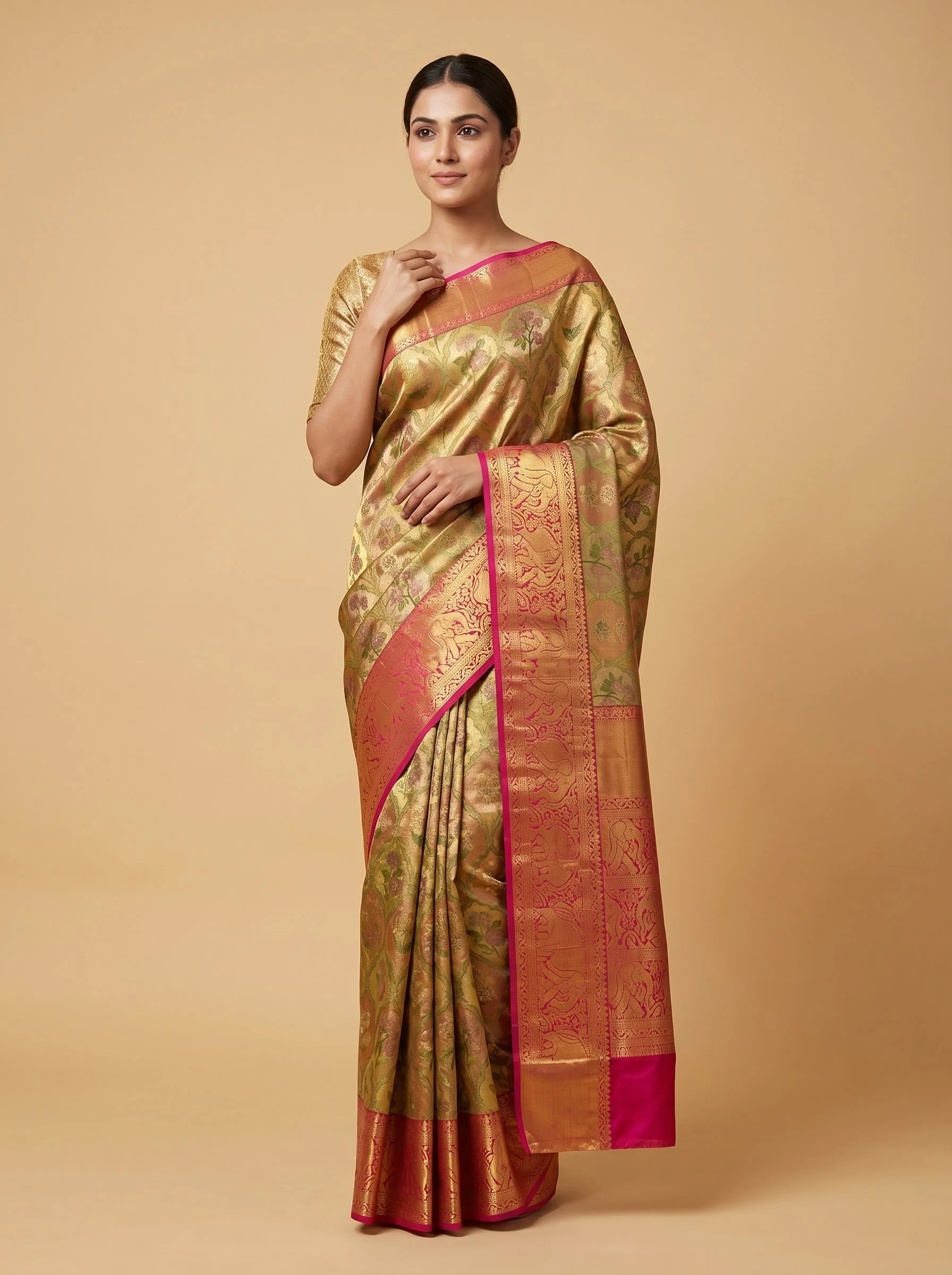 Magenta handloom saree with gold detailing