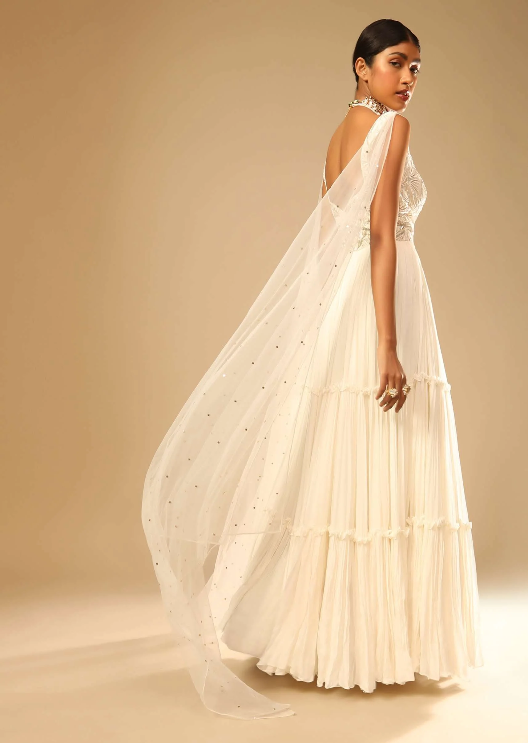 Off White Gown In Georgette With Tiered Flare And Hand Embroidered Leaf Motifs On The Bodice - Image 3