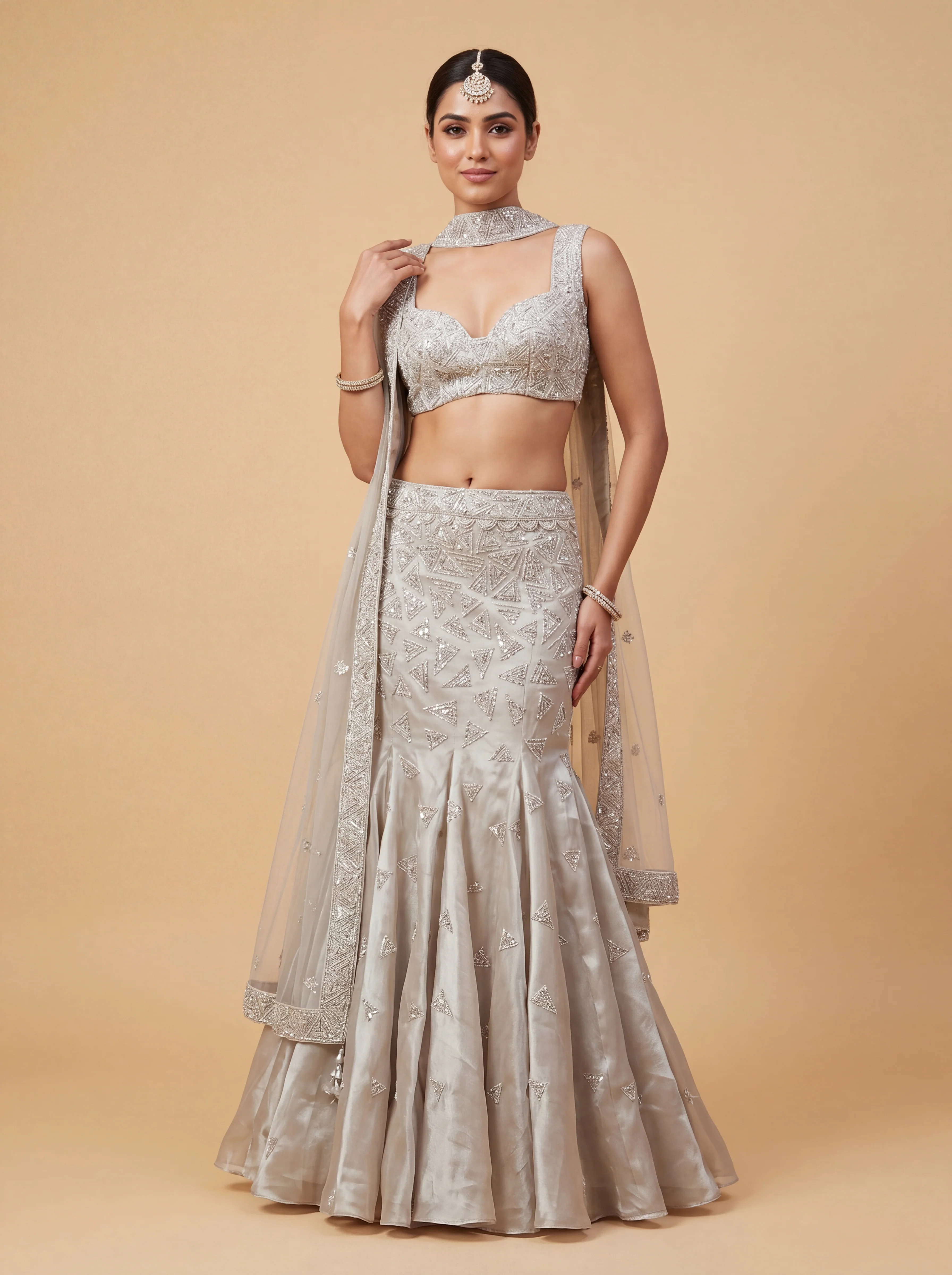 Oyster Contemporary Bridal Lehenga With Sheer Embroidered Volume