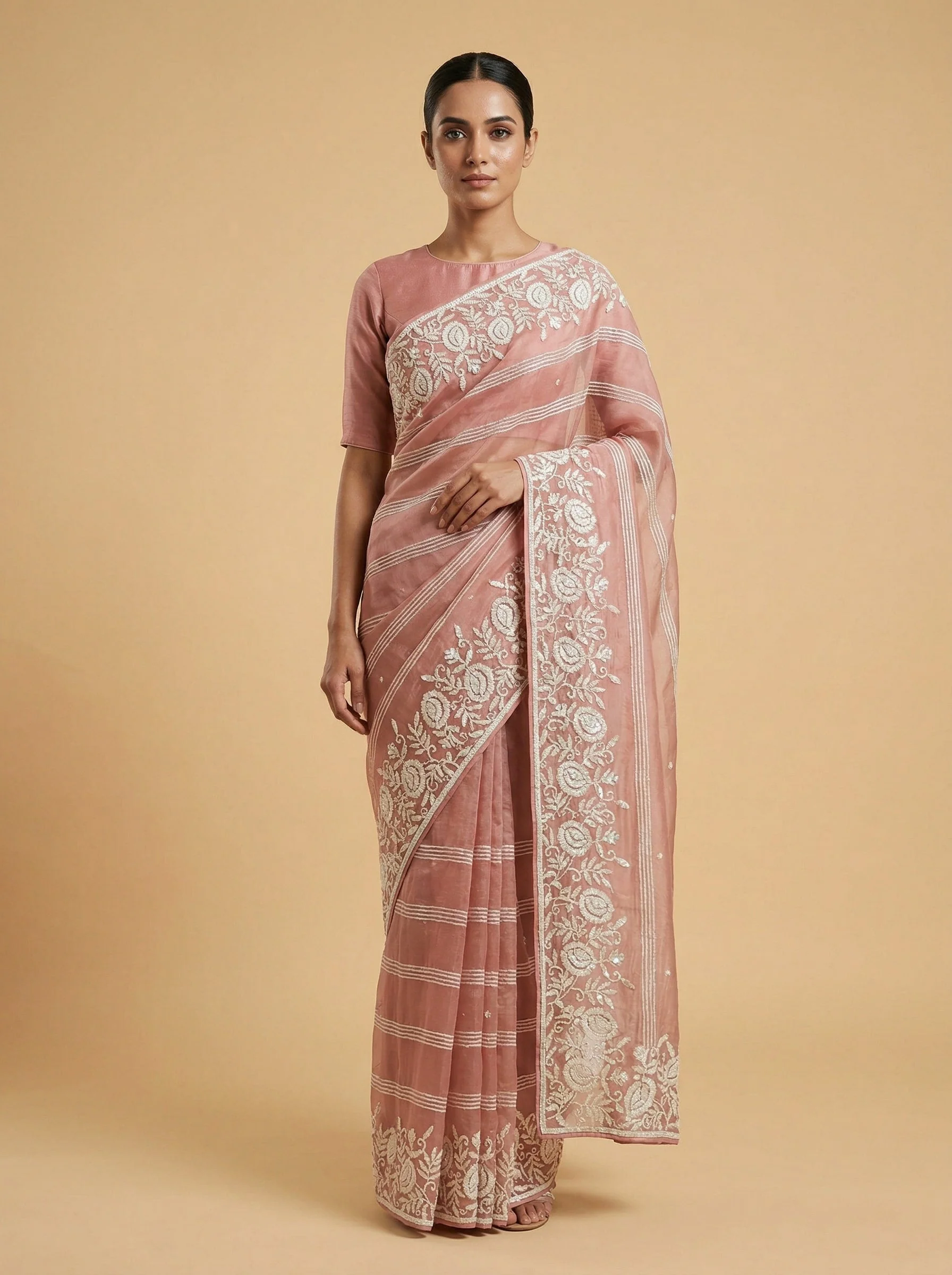 Peach Complimenting Embroidered Saree