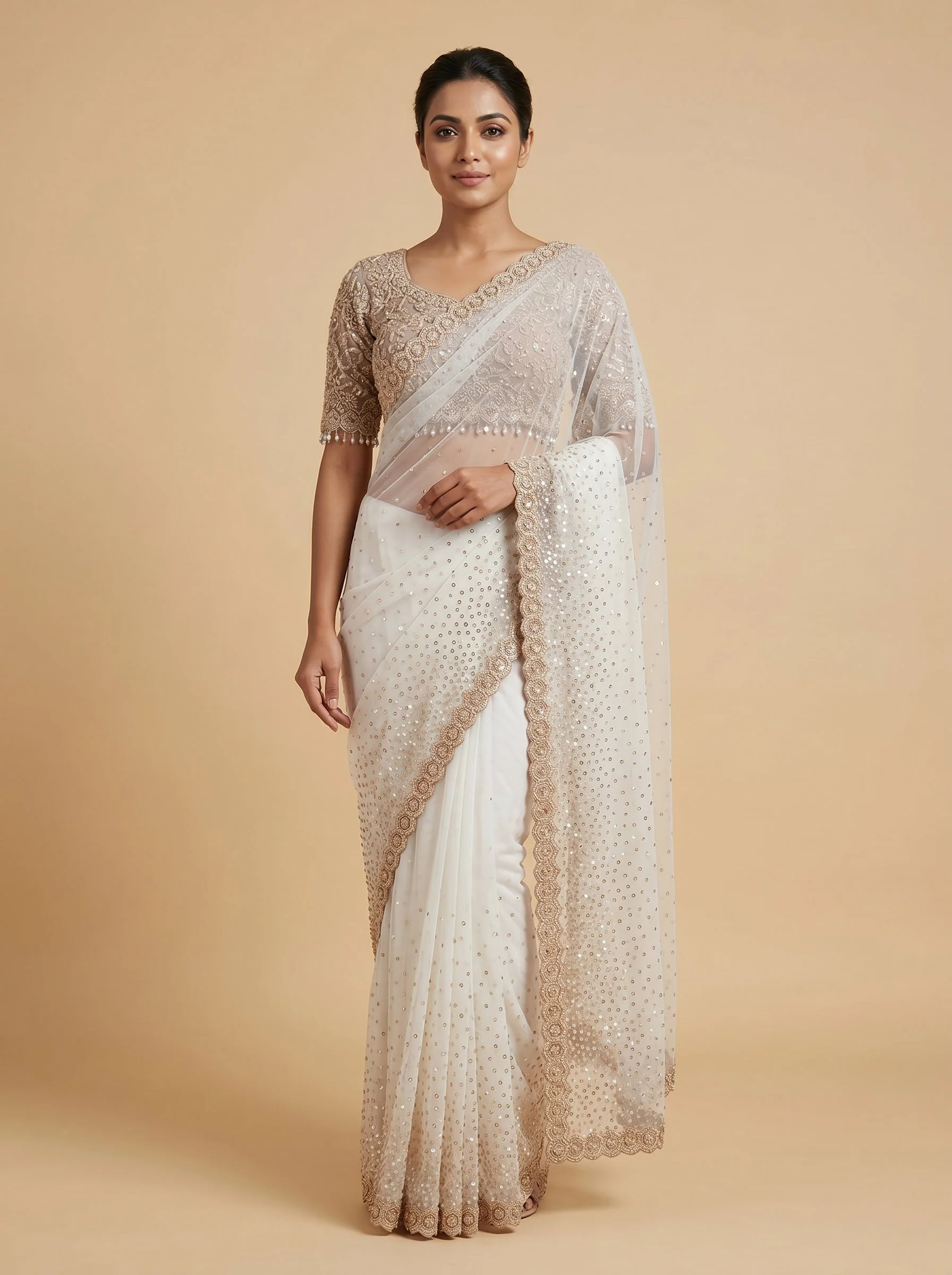 Peach embroidered saree with subtle motifs