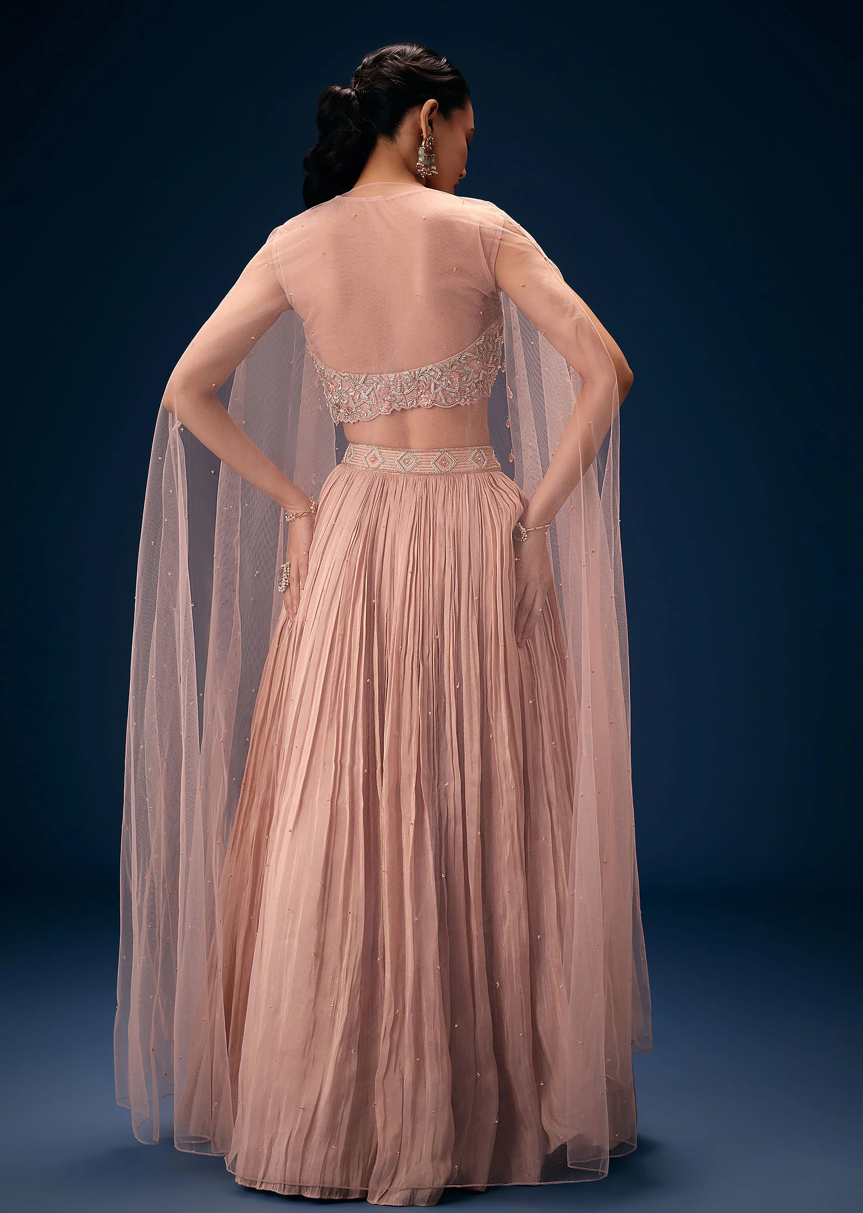 Peach Ruched Lehenga With Embroidered Blouse and Net Cape - Image 5