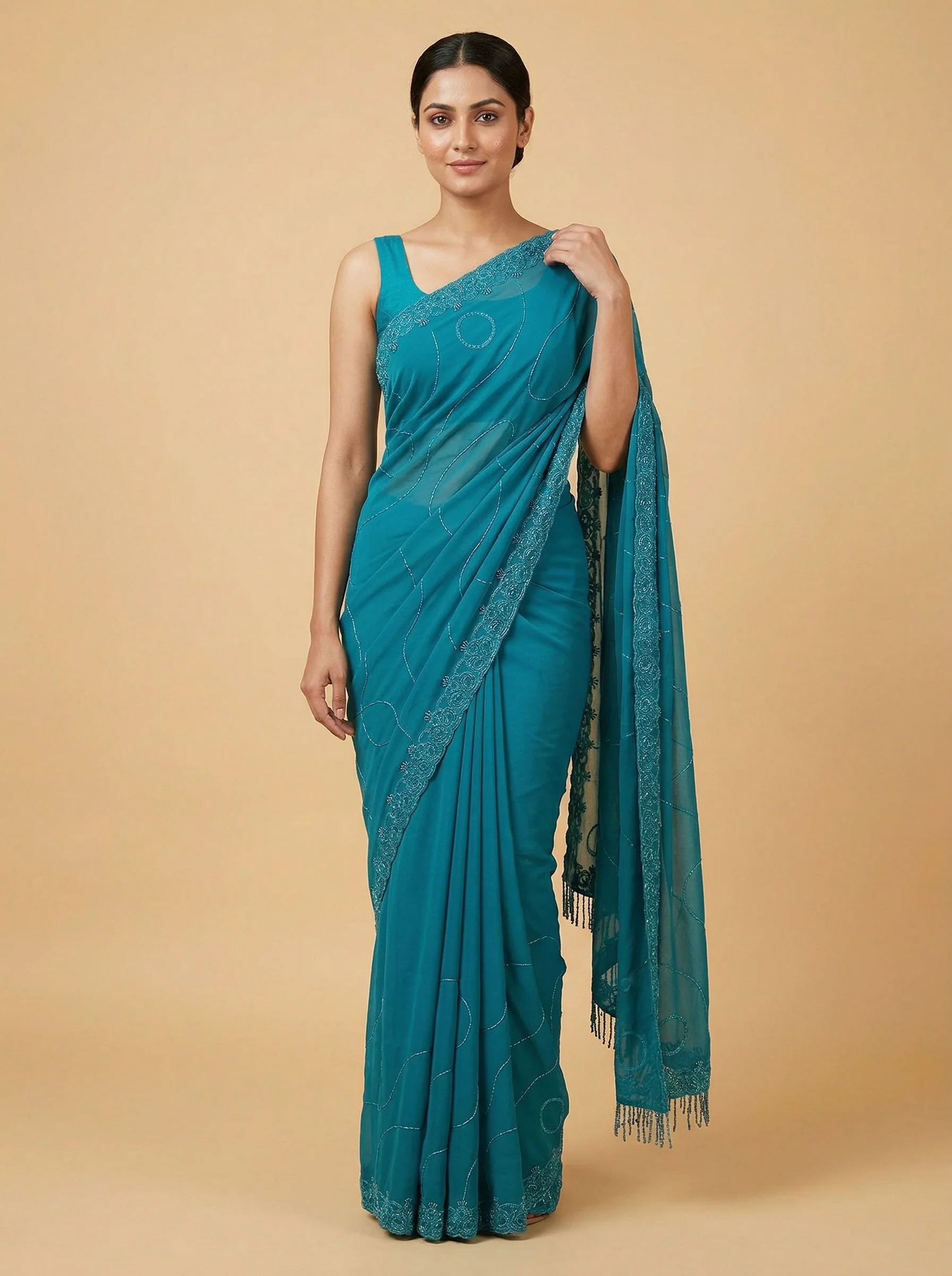 Peacock Blue Crowned Embroidered Saree