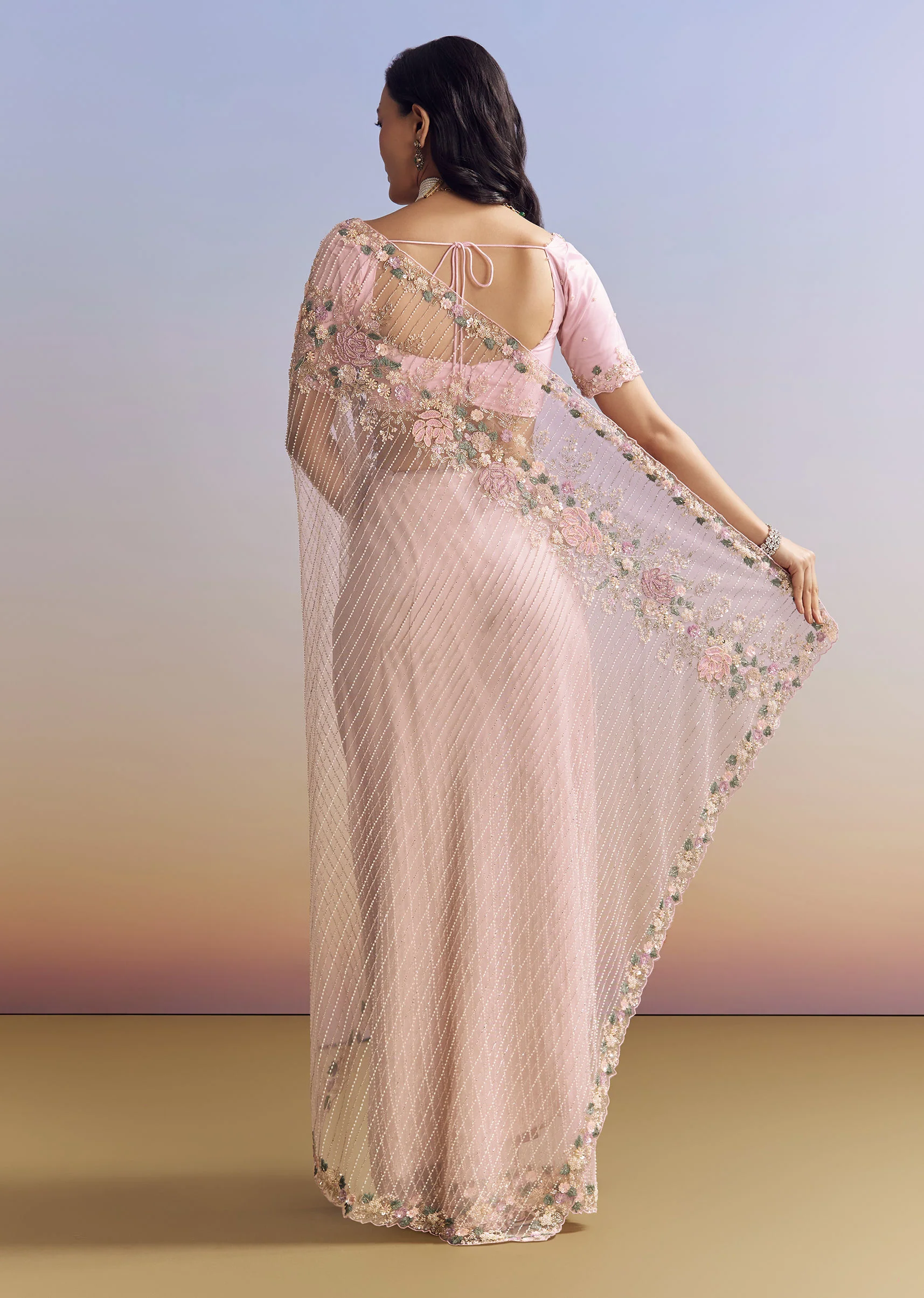 Pink Net Saree With Pastel Floral Embroidery And Resham Detailing - Image 6