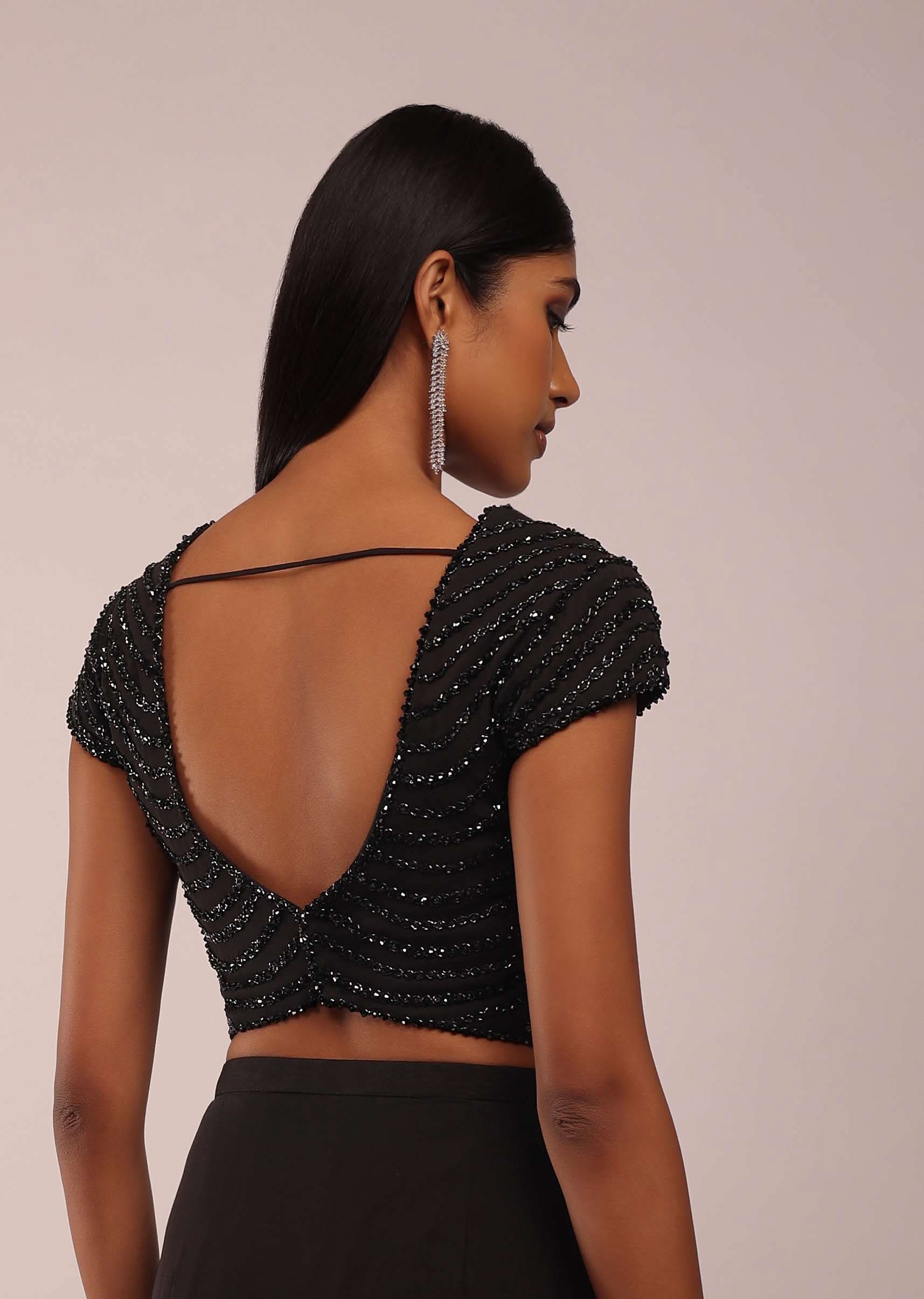 Pitch Black Saree With Three Tones Of Layered Frills On The Bottom Embellished In Stones And Sequins With A Tassel On The Pallu Corner - Image 7