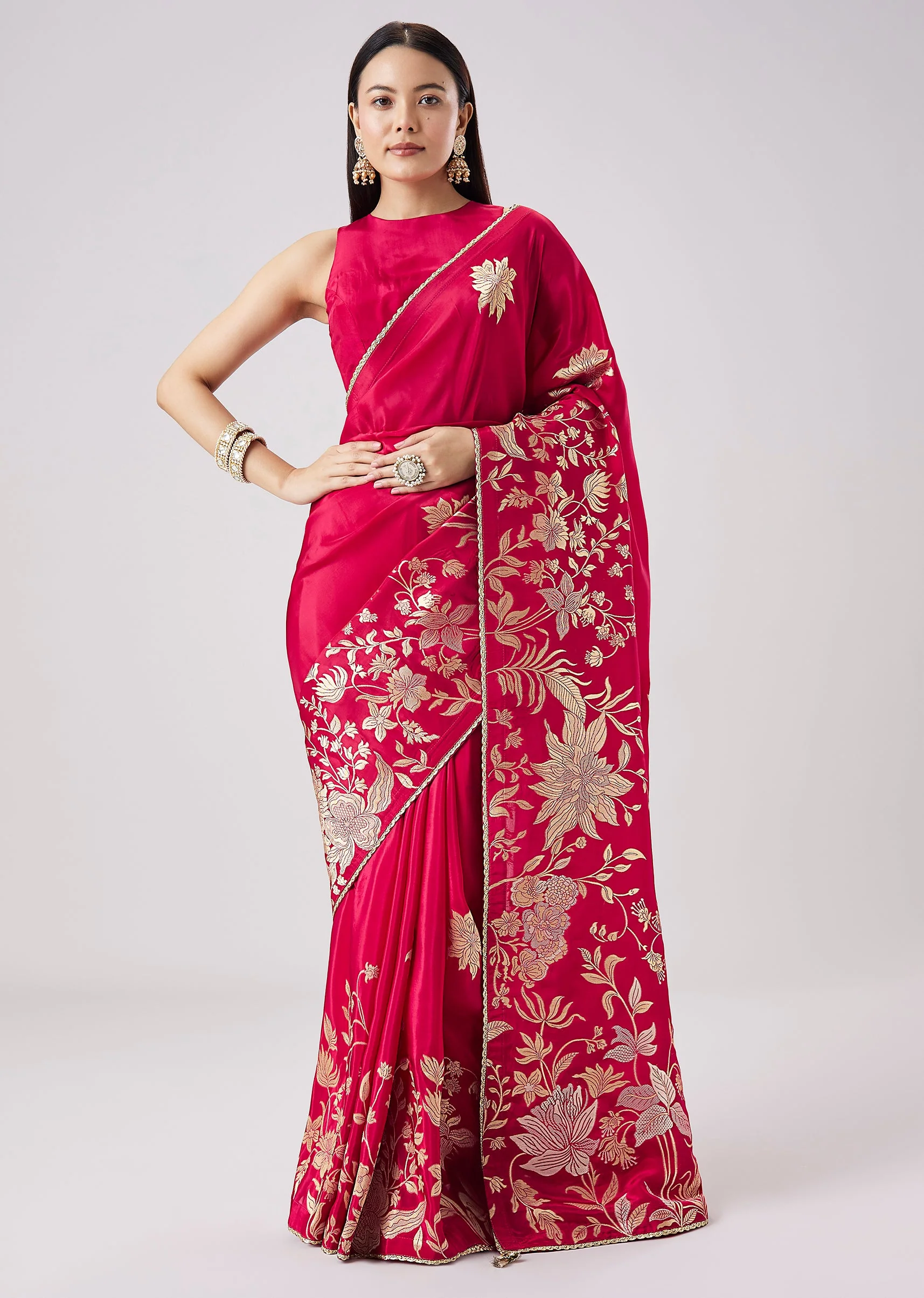 Rani Pink Woven Floral Saree With Unstitched Blouse