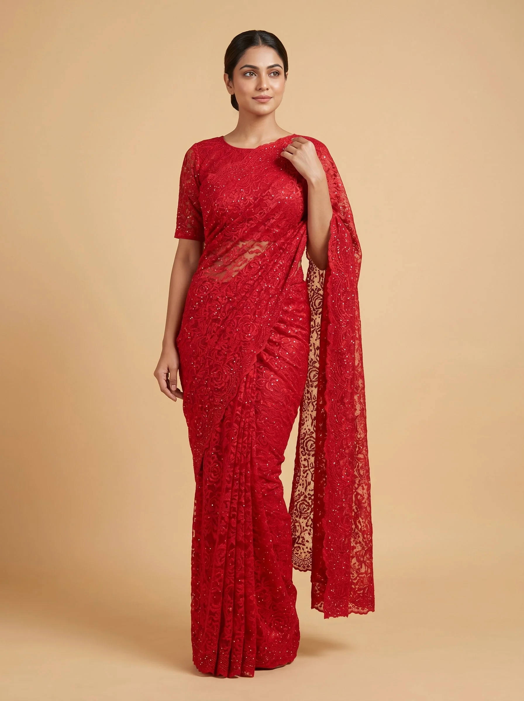 Red embroidered saree with ornate work