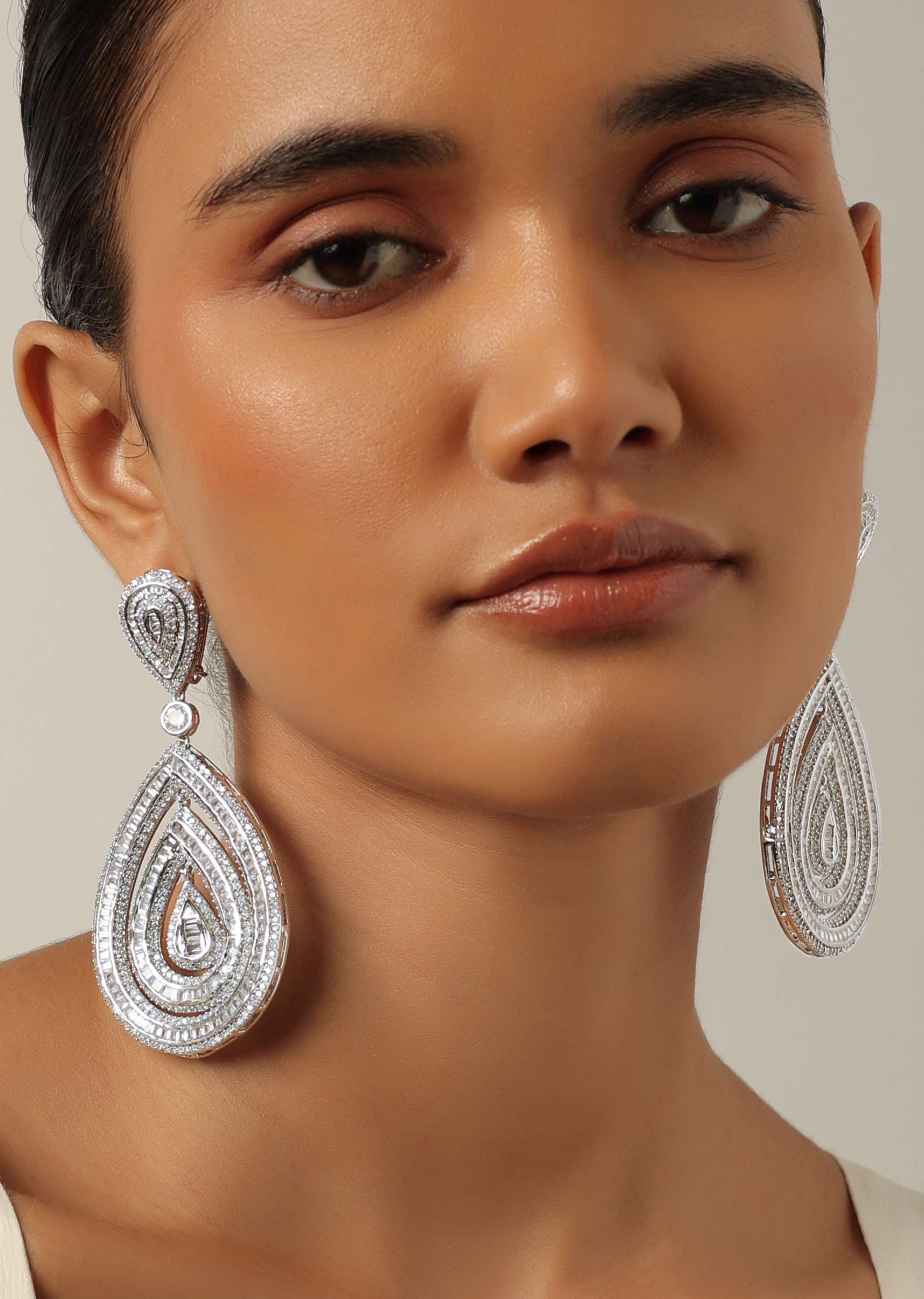 Silver Finish Statement Danglers With Zirconia Stones And Teardrop Motif - Image 2