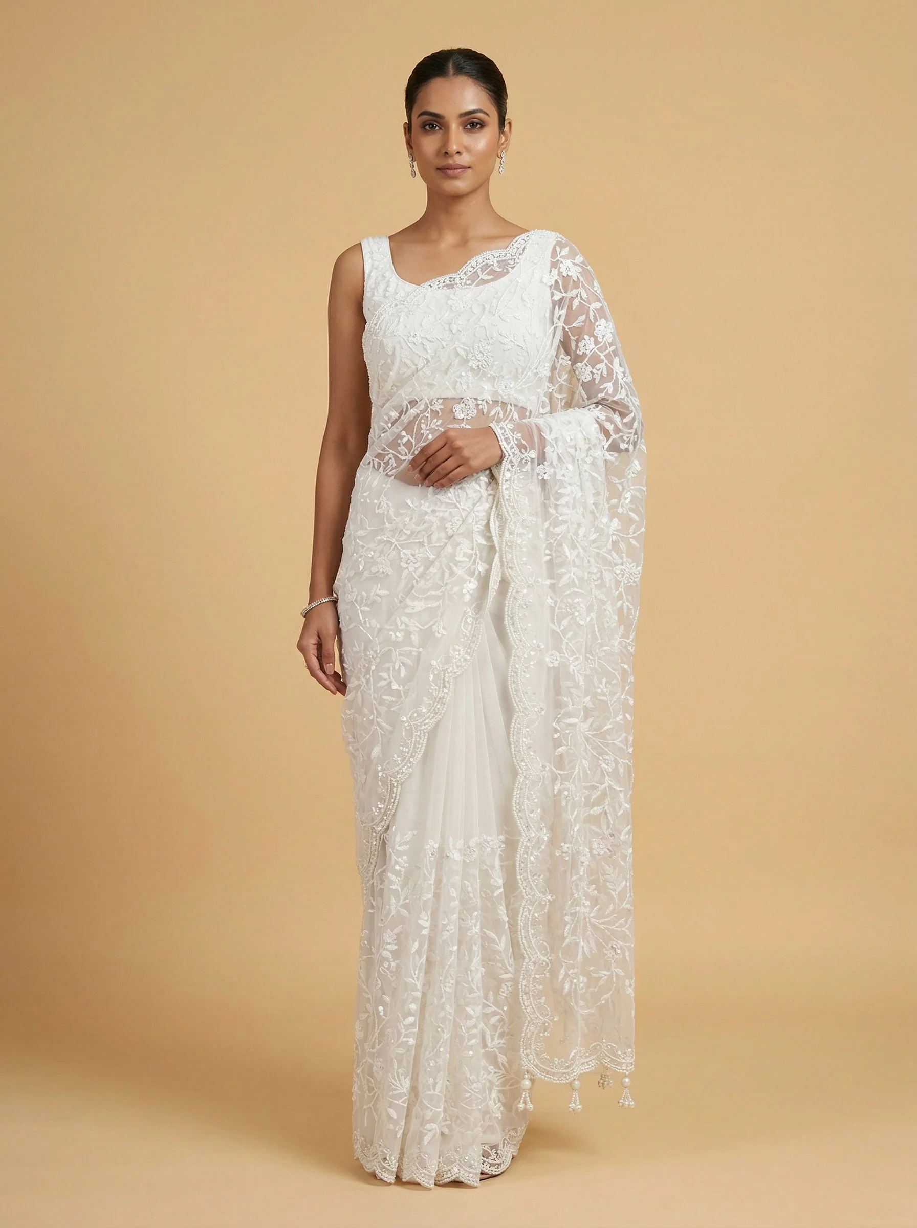White Restrained Embroidered Saree
